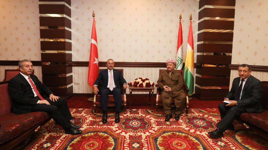 ERBIL, IRAQ  - JUNE 10: Turkish Foreign Minister Mevlut Cavusoglu (2L) meets KDP Leader Masoud Barzani (2R) in Erbil, Iraq on June 10, 2019.  (Photo by Cem Ozdel/Anadolu Agency/Getty Images)