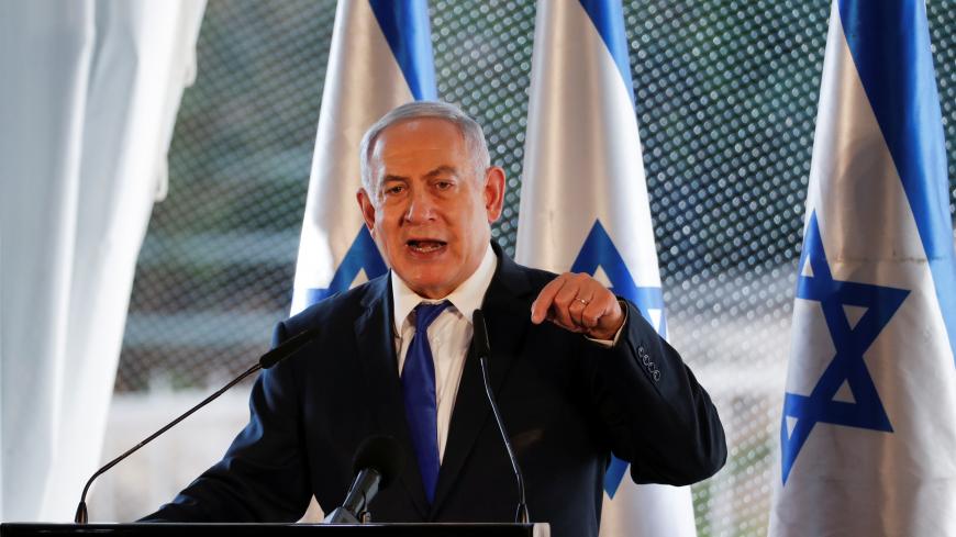Israeli Prime Minister Benjamin Netanyahu gestures as he speaks during a state memorial ceremony at the Tomb of the Patriarchs, a shrine holy to Jews and Muslims, in Hebron in the Israeli-occupied West Bank September 4, 2019. REUTERS/Ronen Zvulun - RC12D72FA830