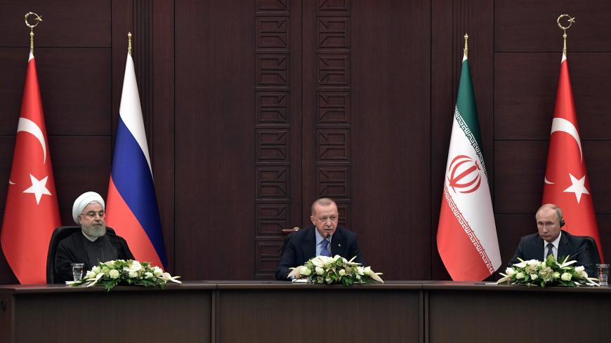 Presidents Vladimir Putin of Russia, Hassan Rouhani of Iran and Tayyip Erdogan of Turkey attend a news conference following their talks in Ankara, Turkey September 16, 2019. Sputnik/Alexei Nikolsky/Kremlin via REUTERS  ATTENTION EDITORS - THIS IMAGE WAS PROVIDED BY A THIRD PARTY. - RC1179072220