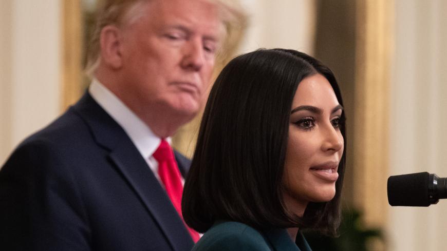 Kim Kardashian speaks alongside US President Donald Trump during a second chance hiring and criminal justice reform event in the East Room of the White House in Washington, DC, June 13, 2019. (Photo by SAUL LOEB / AFP)        (Photo credit should read SAUL LOEB/AFP/Getty Images)