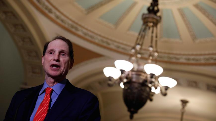 Senator Ron Wyden (D-OR) speaks to reporters on following a policy luncheon on Capitol Hill in Washington, D.C., U.S., May 9, 2017. REUTERS/Aaron P. Bernstein - RC1304787B50