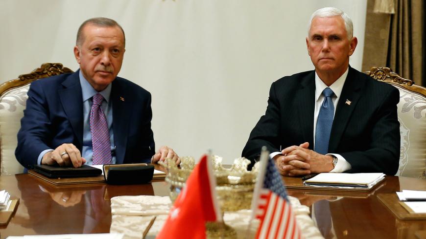 U.S. Vice President Mike Pence meets with Turkish President Tayyip Erdogan at the Presidential Palace in Ankara, Turkey, October 17, 2019. REUTERS/Huseyin Aldemir - RC19DBA7A600