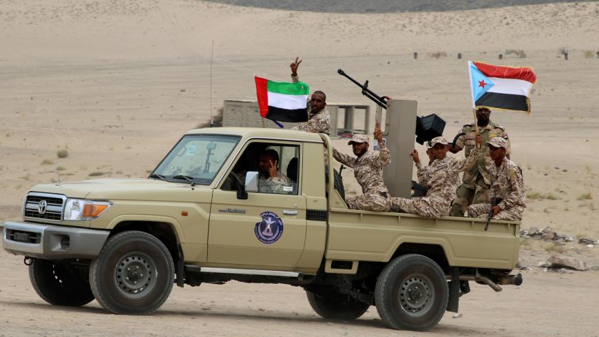Newly recruited troops of the UAE-backed separatist Southern Transitional Council are seen on a vehicle during their graduation in Aden, Yemen July 23, 2019. REUTERS/Fawaz Salman - RC1A52E65510
