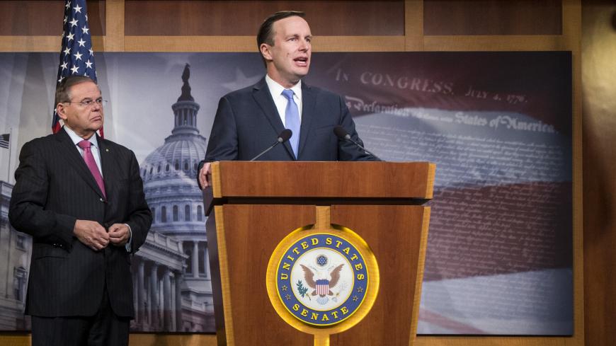 WASHINGTON, DC - DECEMBER 12: Sen. Chris Murphy (D-CT) speaks during a news conference discussing discuss a resolution to end U.S. military support for Saudi Arabia's war with Yemen on Capitol Hill on December 12, 2018 in Washington, DC. Also pictured are Sen. Lindsey Graham (R-SC) and Sen. Bob Menendez (D-NJ).  (Photo by Zach Gibson/Getty Images)