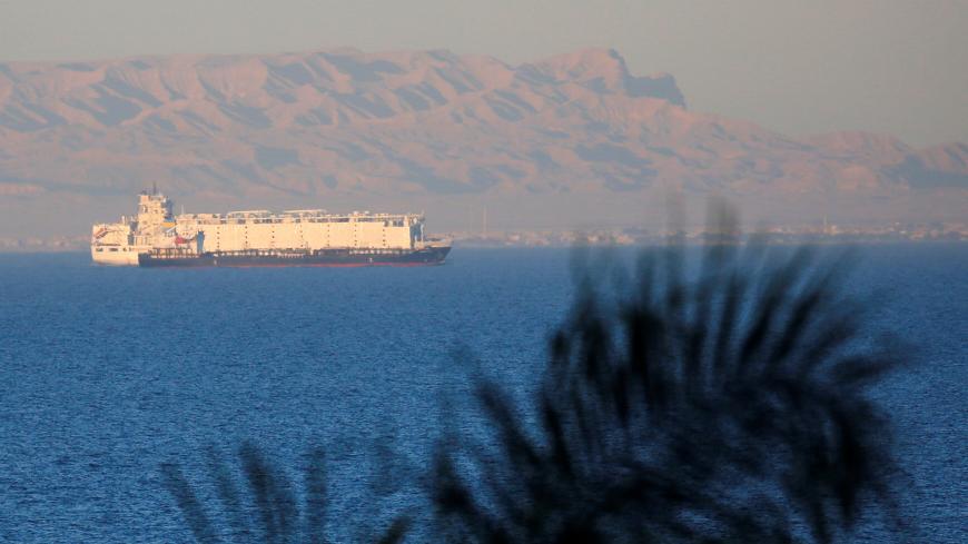 Container ships sail across the Gulf of Suez towards the Red Sea before entering the Suez Canal, in El Ain El Sokhna in Suez, east of Cairo, Egypt, March 17, 2018. Picture taken March 17, 2018. REUTERS/Amr Abdallah Dalsh - RC1C36310DE0