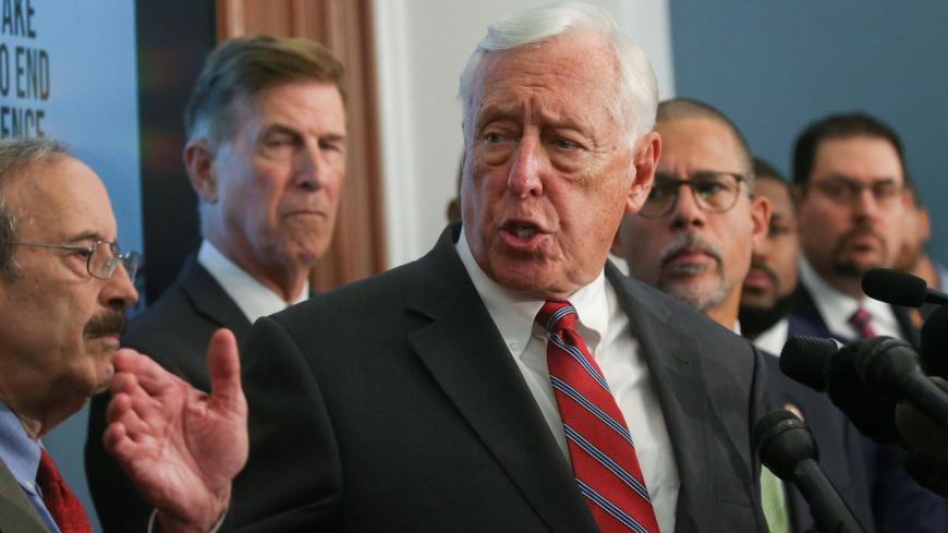 U.S. House Majority Leader Steny Hoyer (D-MD) speaks flanked by Rep Eliot Engel (L) (D-NY) and other Democratic members of Congress as they call on Senate Republicans to take up gun violence legislation already passed by the House requiring background checks on all firearm sales at an event on Capitol Hill in Washington, U.S. August 13, 2019.  REUTERS/Leah Millis - RC1CE886F320
