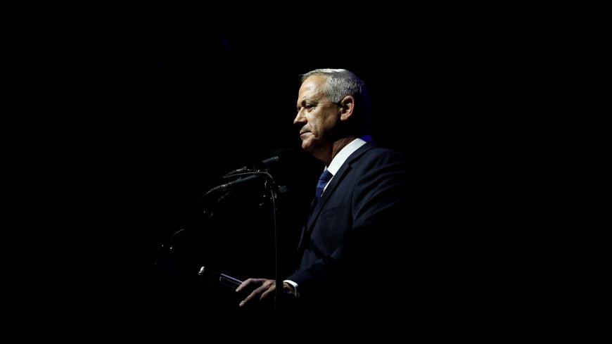 Benny Gantz, head of Blue and White party, speaks during a rally commemorating the 24th anniversary of the assassination of Israeli Prime Minister Yitzhak Rabin, in Tel Aviv, Israel November 2, 2019. REUTERS/Corinna Kern - RC19373C6E90