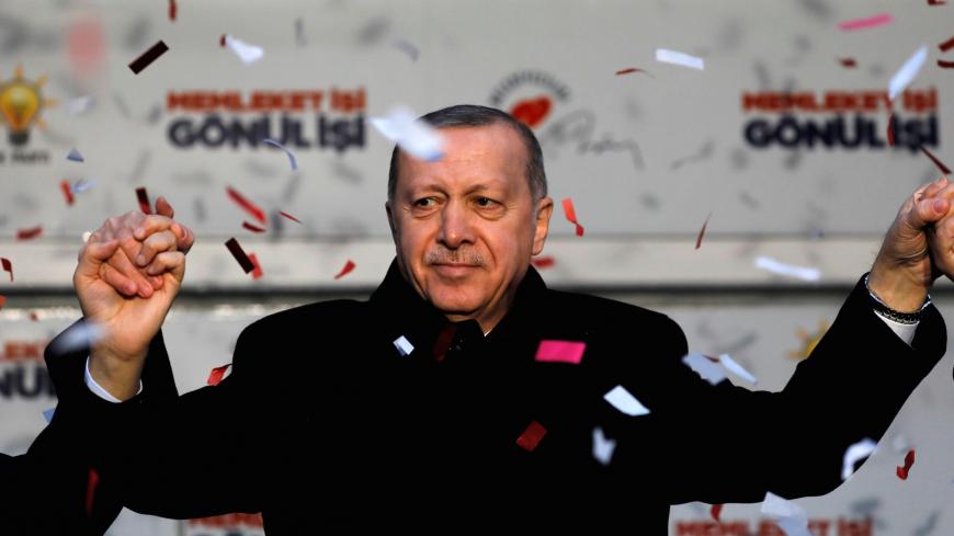 Turkish President Tayyip Erdogan reacts during a rally for the upcoming local elections in Istanbul, Turkey, February 16, 2019. REUTERS/Umit Bektas - RC17A5469390