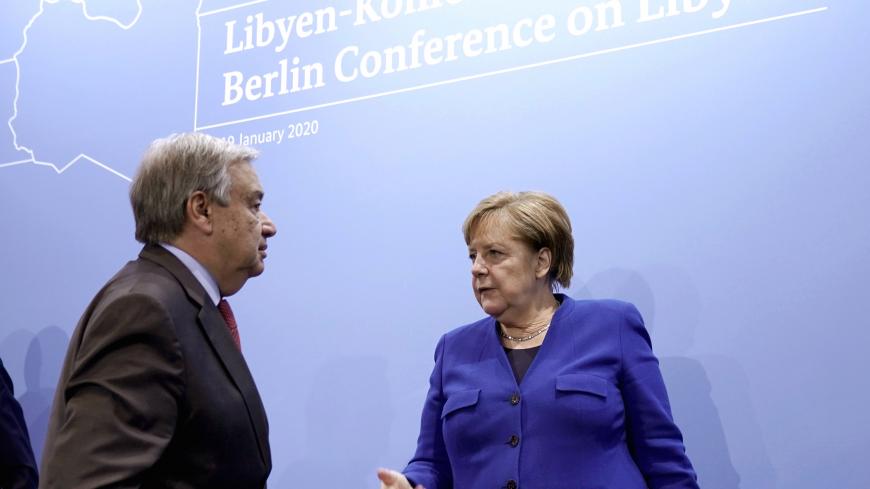 United Nations Secretary-General Antonio Guterres and Germany's Chancellor Angela Merkel leave a news conference after the Libya summit in Berlin, Germany, January 19, 2020.  Michael Kappeler/Pool via Reuters - RC27JE9LBDB3