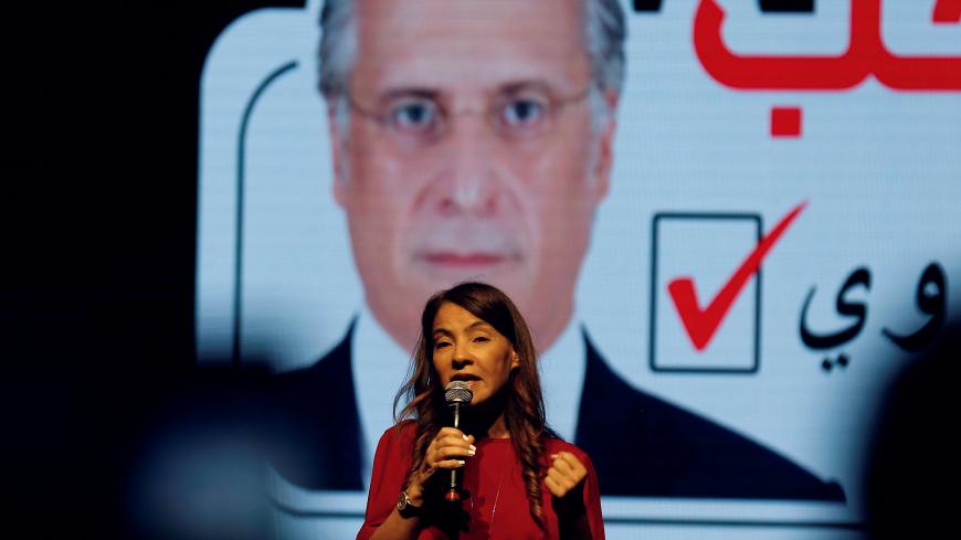 Salwa Karoui, wife of detained Tunisian media mogul and presidential candidate Nabil Karoui, speaks during an election campaign rally in Tunis, Tunisia, September 13, 2019. REUTERS/Zoubeir Souissi - RC1981714B10