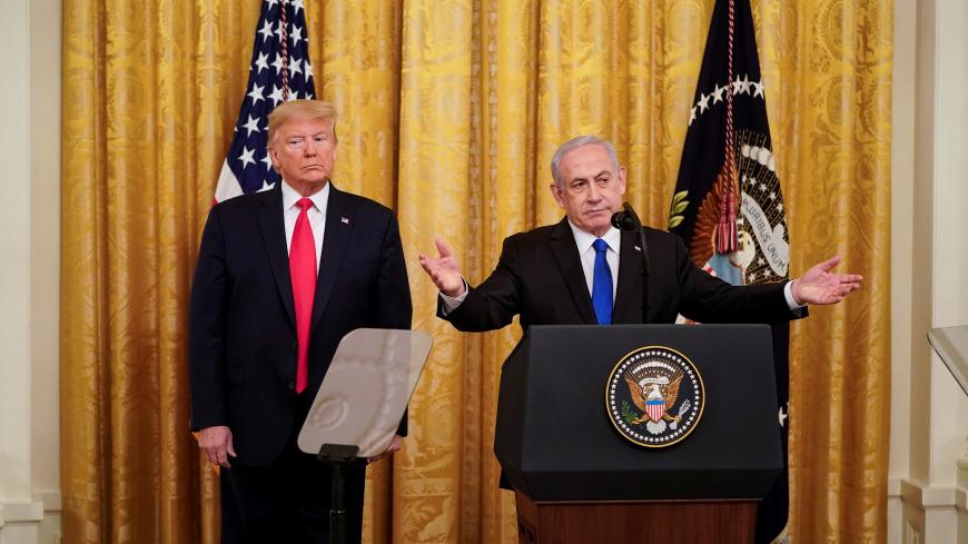 U.S. President Donald Trump and Israel's Prime Minister Benjamin Netanyahu deliver joint remarks on a Middle East peace plan proposal in the East Room of the White House in Washington, U.S., January 28, 2020. REUTERS/Joshua Roberts? - RC27PE93LVFU