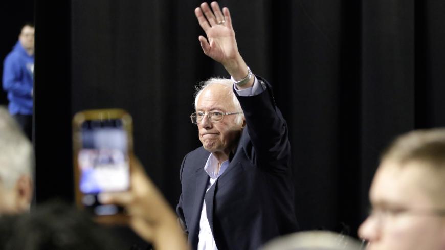 U.S. Democratic 2020 presidential candidate Senator Bernie Sanders waves to the audience at a campaign rally in the Tacoma Dome in Tacoma, Washington, U.S. February 17, 2020. REUTERS/Jason Redmond - RC2T2F9VBSY2