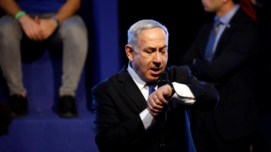 Israeli Prime Minister Benjamin Netanyahu speaks to supporters at a Likud party rally as he campaigns ahead of the upcoming elections, in Rishon Lezion near Tel Aviv, Israel February 18, 2020. REUTERS/Amir Cohen - RC273F9OCVUY