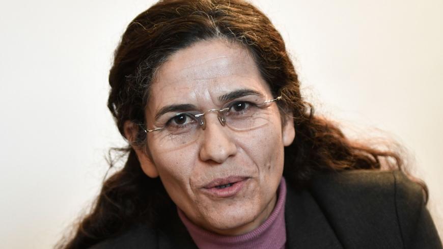 One of the two top political leaders of the Syrian Kurdish alliance and co-chair of the Syrian Democratic Council Ilham Ahmed delivers a speech during a press-conference, in Paris, on December 21, 2018. - Two top political leaders of the Syrian Kurdish alliance battling the Islamic State group visit Paris for talks on the planned US military withdrawal from Syria, an alliance representative said. (Photo by STEPHANE DE SAKUTIN / AFP)        (Photo credit should read STEPHANE DE SAKUTIN/AFP via Getty Images)