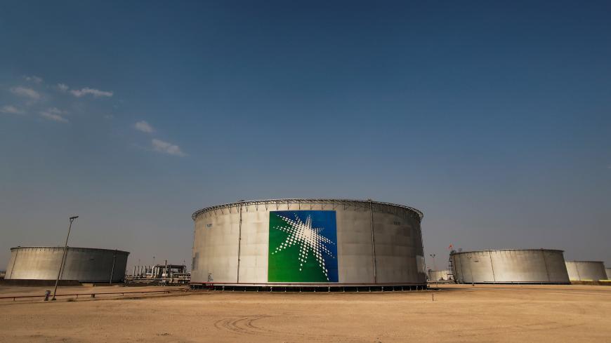 A view shows branded oil tanks at Saudi Aramco oil facility in Abqaiq, Saudi Arabia October 12, 2019. REUTERS/Maxim Shemetov - RC2QVF91B7M0