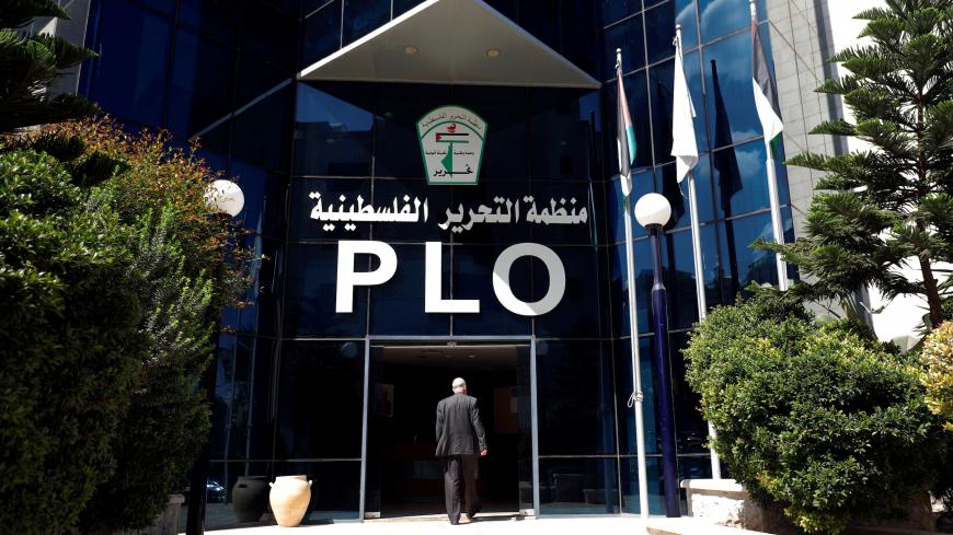 A man enters the headquarters of the Palestinian Liberation Organization (PLO), in Ramallah in the occupied West Bank September 10, 2018. REUTERS/Mohamad Torokman - RC14CC09A900