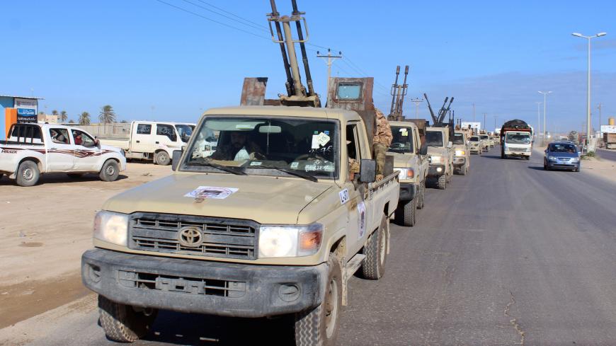 Military vehicles of the Libyan internationally recognised government forces head out to the front line from Misrata, Libya February 3, 2020. REUTERS/Ayman Al-Sahili - RC24TE96MEQG