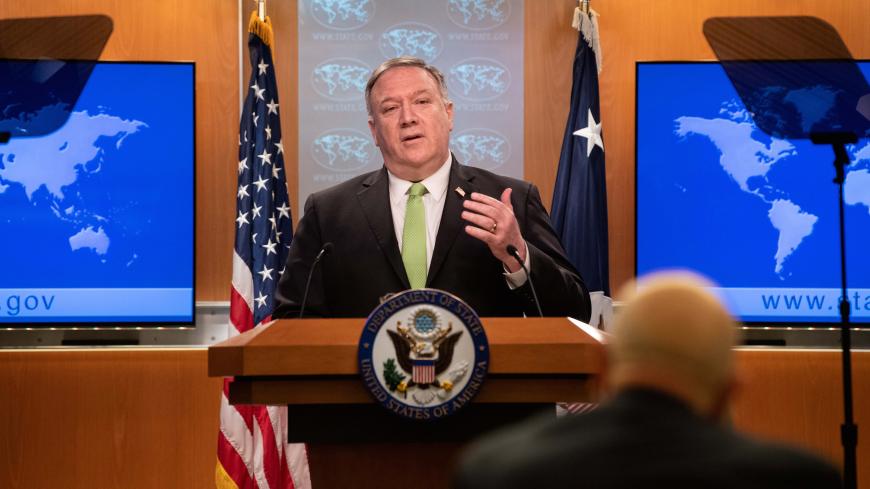 U.S. Secretary of State Mike Pompeo speaks to the media at the State Department in Washington, DC, U.S., May 20, 2020. Nicholas Kamm/Pool via REUTERS - RC2FSG9O20JT