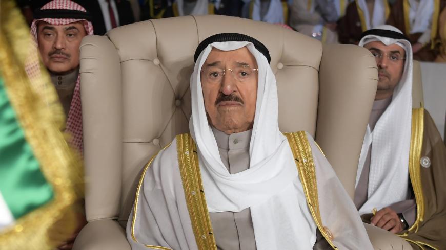 Kuwait's Emir Sheikh Sabah al-Ahmad al-Jaber al-Sabah (C) attends the oppening session of the 30th Arab League summit in the Tunisian capital Tunis on March 31, 2019. (Photo by FETHI BELAID / POOL / AFP)        (Photo credit should read FETHI BELAID/AFP via Getty Images)