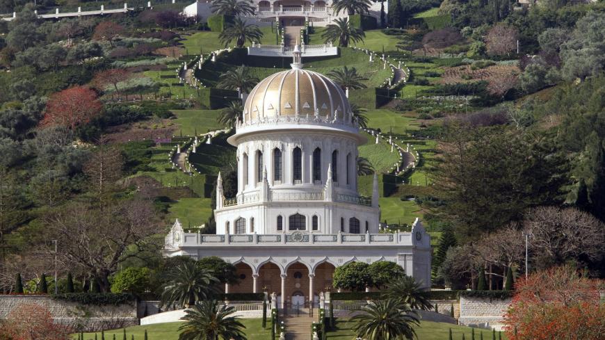 A general view shows the terraced gardens and the golden Shrine of Bab following renovation works at the Bahai World Center, in the Israeli port city of Haifa, on April 12, 2011. The restoration work in the Bahai Faith second holiest site began in 2008 and was carried out by volunteers from Mongolia, China, Ecuador, Kenya, Germany, Canada, U.S, South Africa, Vanuatu, India and New Zealand . The gardens, tucked into the steep slopes of mount Carmel, are designed in nine concentric circles around the shrine w