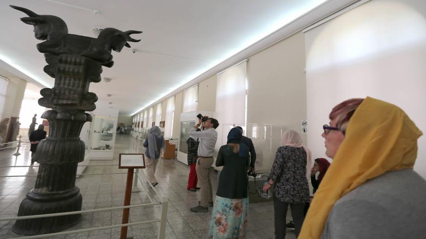 Tourists visit The National Museum of Iran in Tehran on October 09, 2018. (Photo by ATTA KENARE / AFP)        (Photo credit should read ATTA KENARE/AFP via Getty Images)