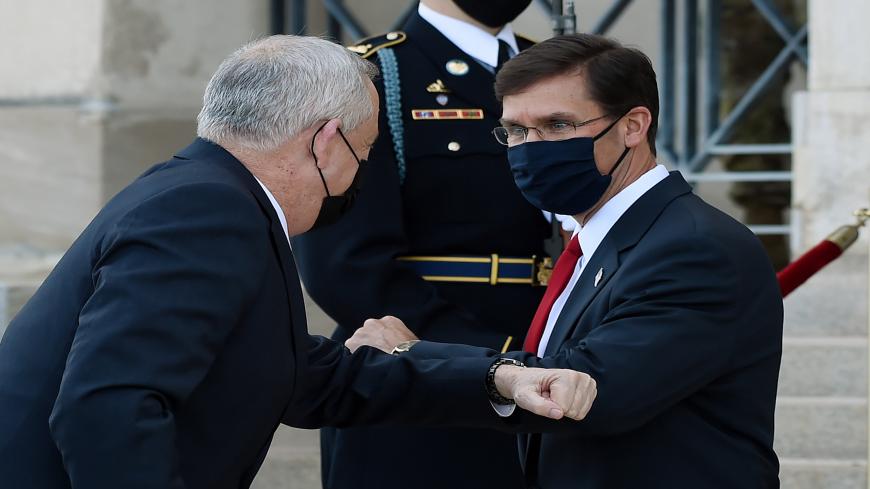US Secretary of Defense Mark Esper (R) welcomes Israeli Defense Minister Benny Gantz during an honor cordon at the Pentagon on September 22, 2020 in Washington, DC. (Photo by Olivier DOULIERY / AFP) (Photo by OLIVIER DOULIERY/AFP via Getty Images)