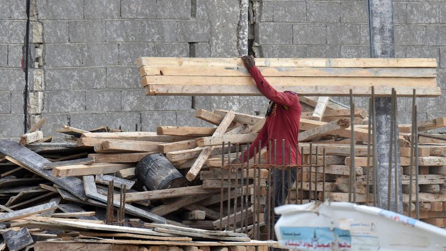 A foreign labourer works on the construction of a house in the Saudi capital Riyadh on April 13, 2019. - Housing is a potential lightning rod for public discontent in a country where affordable dwellings are beyond the reach of many, posing a key challenge for Crown Prince Mohammed bin Salman as he seeks to overhaul the oil-reliant economy. (Photo by FAYEZ NURELDINE / AFP)        (Photo credit should read FAYEZ NURELDINE/AFP via Getty Images)