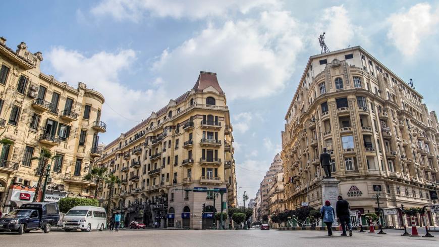 TOPSHOT - This picture taken on March 8, 2019 shows a view of the central Talaat Harb square in the Egyptian capital Cairo's downtown district. - Cairo's unique downtown district, with its elegant centuries-old, European-designed buildings, is wrestling to preserve its cultural heritage as the government prepares to move offices to a new desert capital. (Photo by Khaled DESOUKI / AFP)        (Photo credit should read KHALED DESOUKI/AFP via Getty Images)