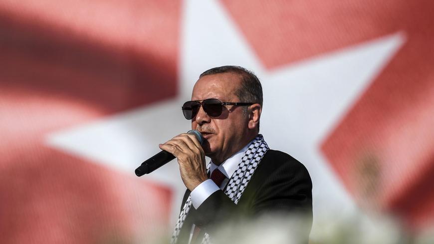 Turkish President Recep Tayyip Erdogan addresses a protest rally in Istanbul on May 18, 2018,  against the recent killings of Palestinian protesters on the Gaza-Israel border and the US embassy move to Jerusalem. (Photo by OZAN KOSE / AFP) (Photo by OZAN KOSE/AFP via Getty Images)
