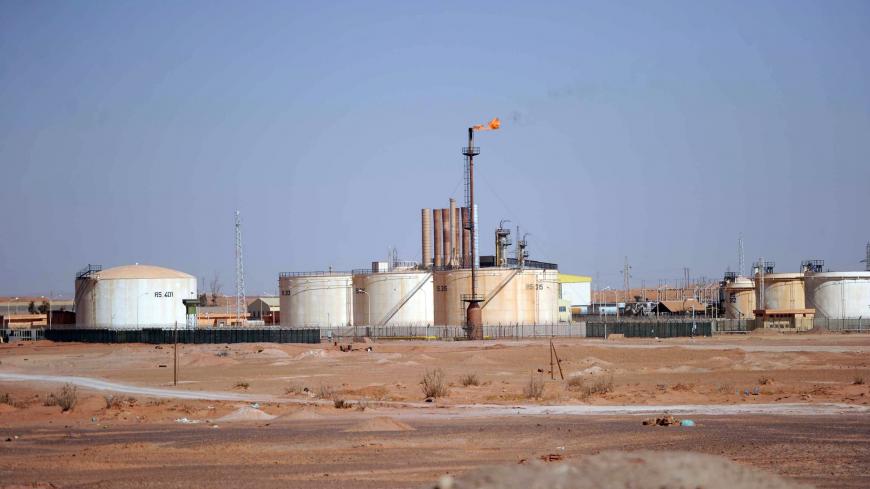 A general view shows an oil installation on the outskirts of In Amenas, deep in the Sahara near the Libyan border, on January 18, 2013. Islamist hostage-takers at a nearby gas field in the area, more than 1,300 kms southeast of the capital Algiers, demanded a prisoner swap and an end to the French military campaign in Mali, a report said, while 30 foreigners were reported still missing in the worst international hostage drama for years. AFP PHOTO/FAROUK BATICHE        (Photo credit should read FAROUK BATICH