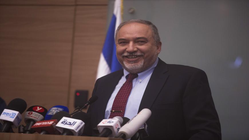 JERUSALEM, ISRAEL - NOVEMBER 14:  (ISRAEL OUT) Israeli Defense Minister Avigdor Lieberman smiles during a press conference at the Israeli Parliament on November 14, 2018 in Jerusalem, Israel. Lieberman has announced his resignation as Defense Minister of Israel as a protest against the cease-fire Israel agreed to with Hamas following recent heavy rocket fire targeting Israel from Gaza Strip.  (Photo by Lior Mizrahi/Getty Images)