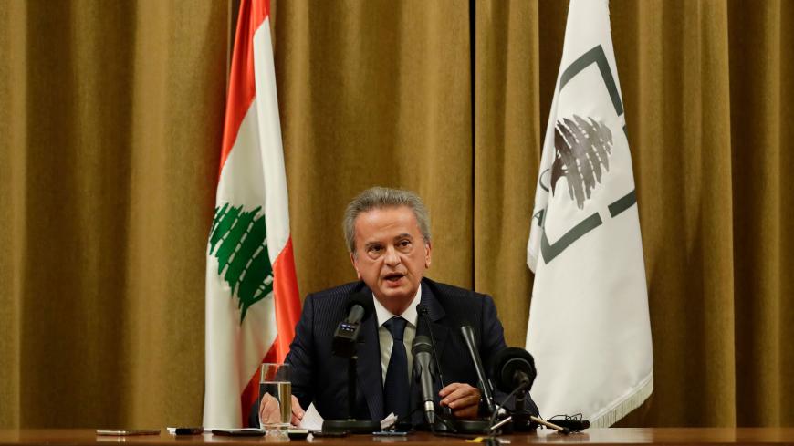 Lebanon's Central Bank Governor Riad Salameh speaks during a press conference at the bank's headquarters in Beirut on November 11, 2019. - Lebanon's central bank said it would strive to maintain the local currency's peg to the dollar and ease access to the greenback after weeks of mass protests. For two decades, the Lebanese pound has been pegged to the greenback at around 1,500 pounds to the dollar, and both currencies have been used interchangeably in daily life. (Photo by JOSEPH EID / AFP) (Photo by JOSE