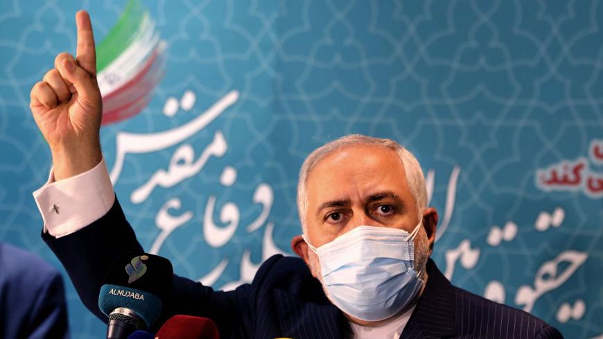 Iranian Foreign Minister Mohammad Javad Zarif speaks during a press conference at the International Conference on the Legal-International Claims of the Holy Defense in the capital Tehran on February 23, 2021. (Photo by ATTA KENARE / AFP) (Photo by ATTA KENARE/AFP via Getty Images)