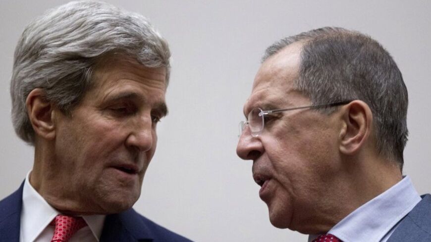 U.S. Secretary of State John Kerry (L) and Russia's Foreign Minister Sergei Lavrov talk during a photo opportunity at the United Nations in Geneva November 24, 2013. Iran and six world powers reached a breakthrough deal early on Sunday to curb Tehran's nuclear programme in exchange for limited sanctions relief, in what could be the first sign of an emerging rapprochement between the Islamic state and the West. REUTERS/Carolyn Kaster/Pool (SWITZERLAND - Tags: POLITICS ENERGY) - RTX15QQF