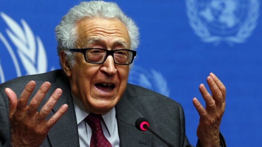U.N.-Arab League envoy for Syria Lakhdar Brahimi addresses a news conference at the United Nations European headquarters in Geneva January 27, 2014. International mediator Brahimi said on Monday that the Syrian parties were still discussing how women and children can leave the Old City of Homs, but that there had been no decision on allowing access for an aid convoy into the besieged city. Brahimi, addressing a news conference after meeting both sides, said that there was an apparent will to continue the ne