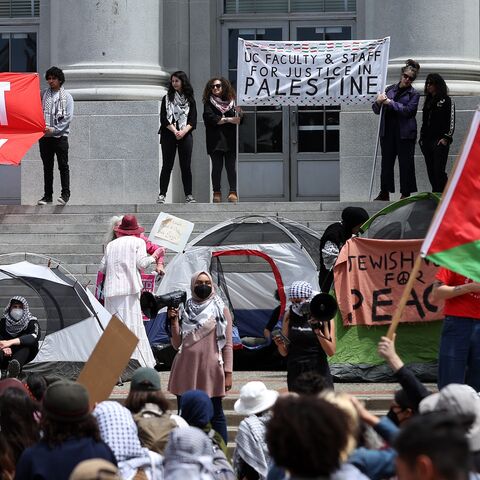 Pro-Palestinian protesters set up a tent encampment during a demonstration in front of Sproul Hall on the UC Berkeley campus on April 22, 2024, in Berkeley, California. 