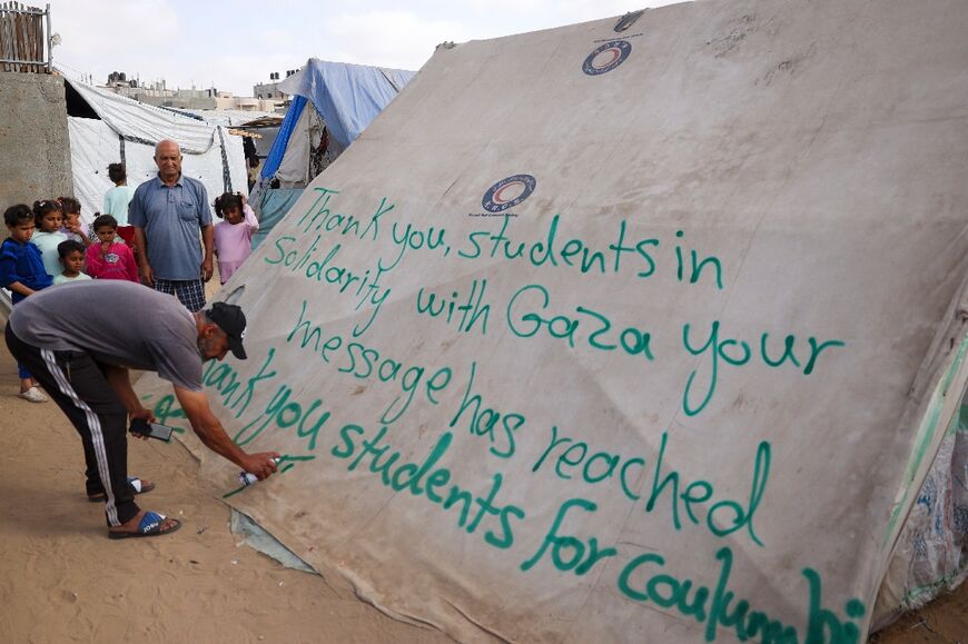 In the city of Rafah, a man thanks students protesting across Gaza