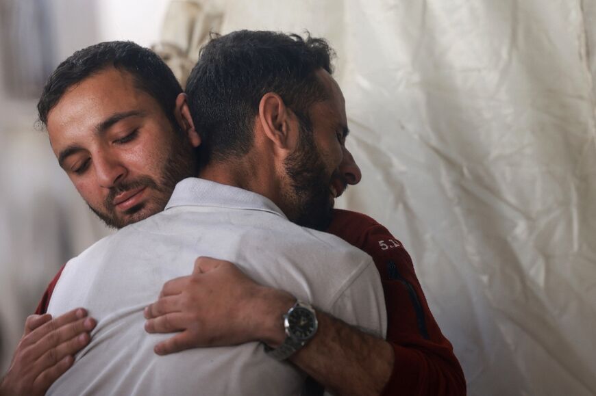 Palestinians mourn relatives killed by Israeli bombardment in Rafah
