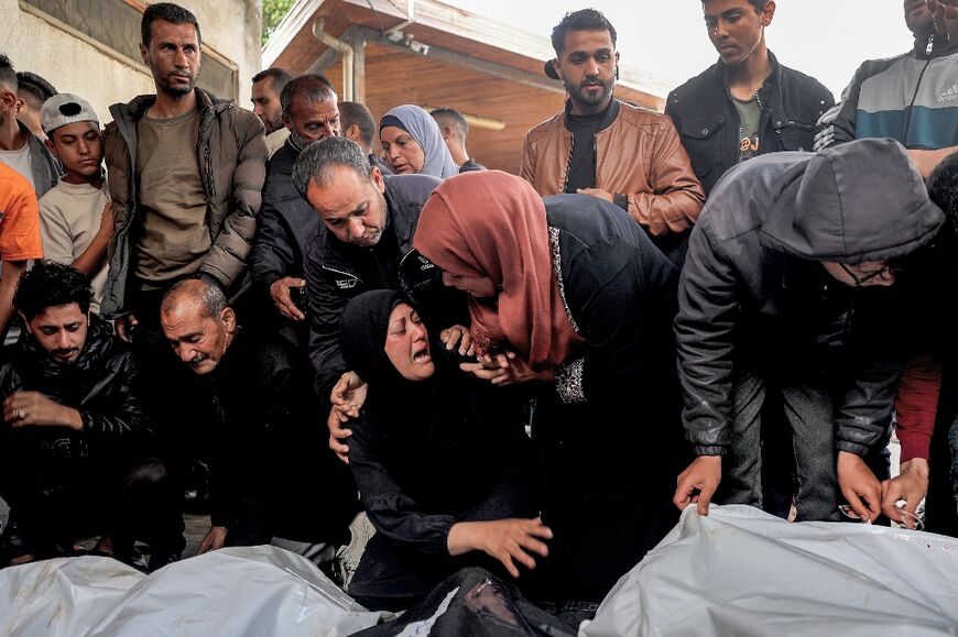 Relatives mourn at Al-Najjar hospital in Rafah 