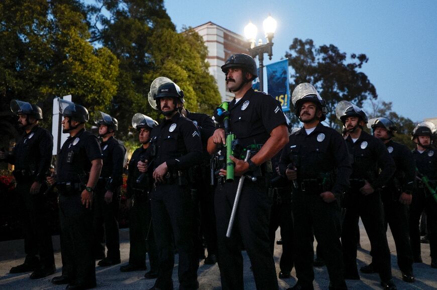 Police officers moved deliberately and slowly to clear a protest camp at UCLA