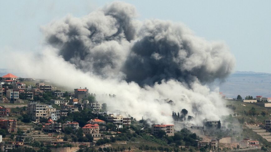 Smoke billows over the southern Lebanese village of Khiam after an Israeli strike