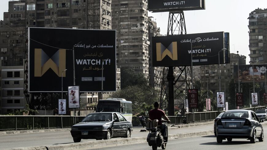 A picture taken on May 7, 2019 shows billboards advertising "Watch iT", Egypt's first video-streaming app, in the capital Cairo. - The video-streaming app was launched this month just in time for the Muslim holy month of Ramadan, the high season for the television industry, but its debut has been dragged by critics over high prices and technical failures. (Photo by Khaled DESOUKI / AFP) (Photo credit should read KHALED DESOUKI/AFP via Getty Images)