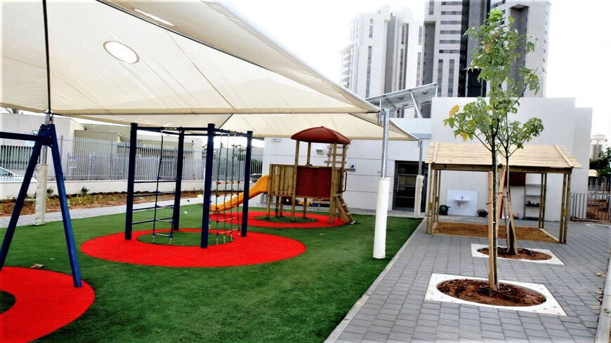 A view of the outdoor playground of the net-zero energy kindergarten building, Hadera, Israel, December 2020.