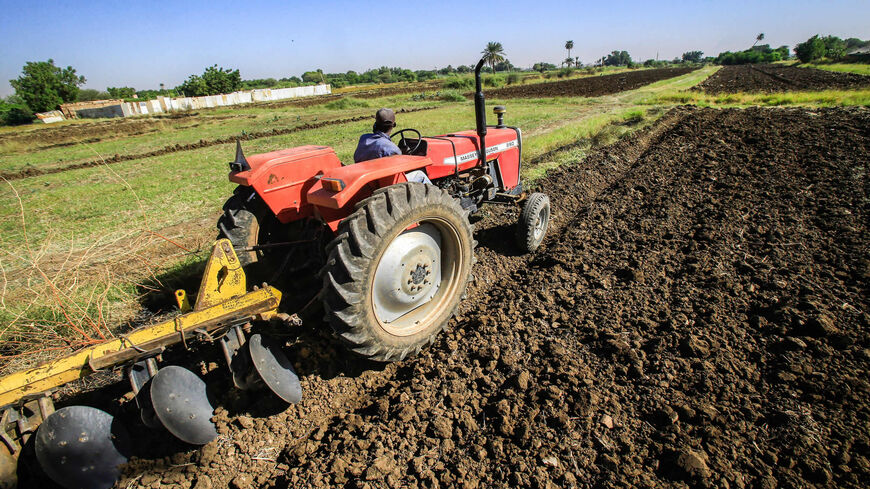 A tractor ploughs an agricultural field in Khartoum's district of Jureif Gharb, Sudan, Nov. 11, 2019.