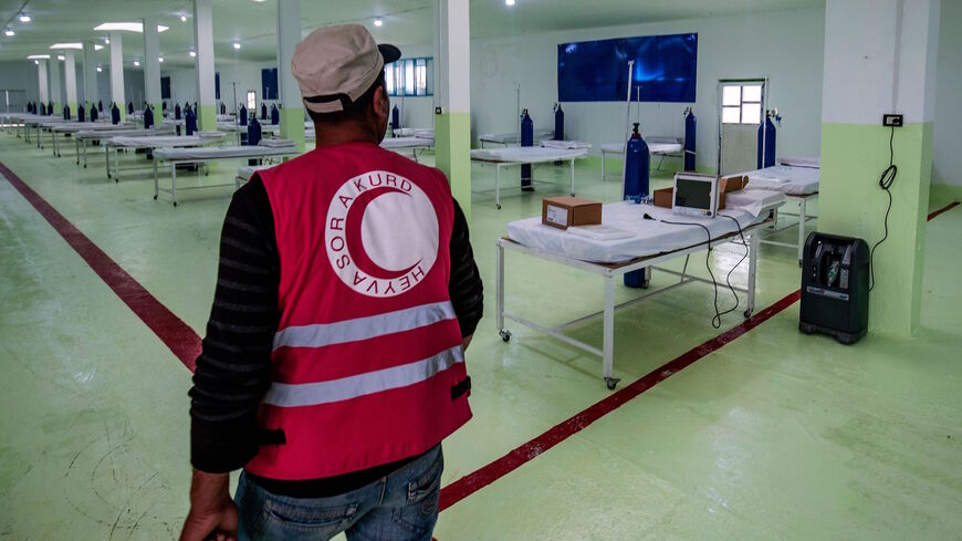 A picture taken on April 20, 2020 shows a 120-bed ward at a specialised hospital for coronavirus cases inaugurated by the Kurdish Red Crescent around 10 kilometres outside the Syrian city of Hasakeh after the first COVID-19 death was reported in the northeastern region. 
