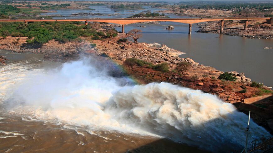 A picture shows water bursting out of the Roseires Dam on the Blue Nile River at al-Damazin in southeastern Sudan, on Nov. 27, 2020. The Roseires hydropower complex is located 105 kilometers east of the Grand Ethiopian Renaissance Dam.