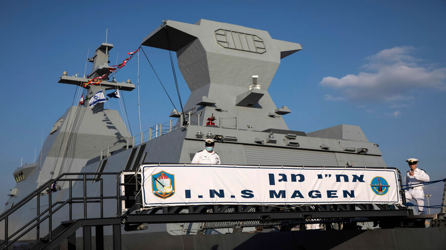 Israeli sailors stand on board the first of four new German-built Saar 6 naval vessels purchased by the navy, in the northern Haifa city naval base, Israel, Dec. 2, 2020. 