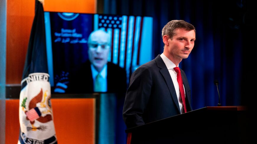 US special envoy for Yemen Timothy Lenderking, accompanied by State Department spokesman Ned Price, right, speaks via teleconference during a news conference at the State Department in Washington, DC, on Feb. 16, 2021.