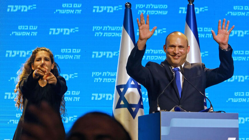 Naftali Bennett, leader of the Israeli right-wing Yamina ('New Right') party, addresses supporters at his party's campaign headquarters in the Mediterranean coastal city of Tel Aviv early on March 24, 2021, after the end of voting in the fourth national election in two years. 