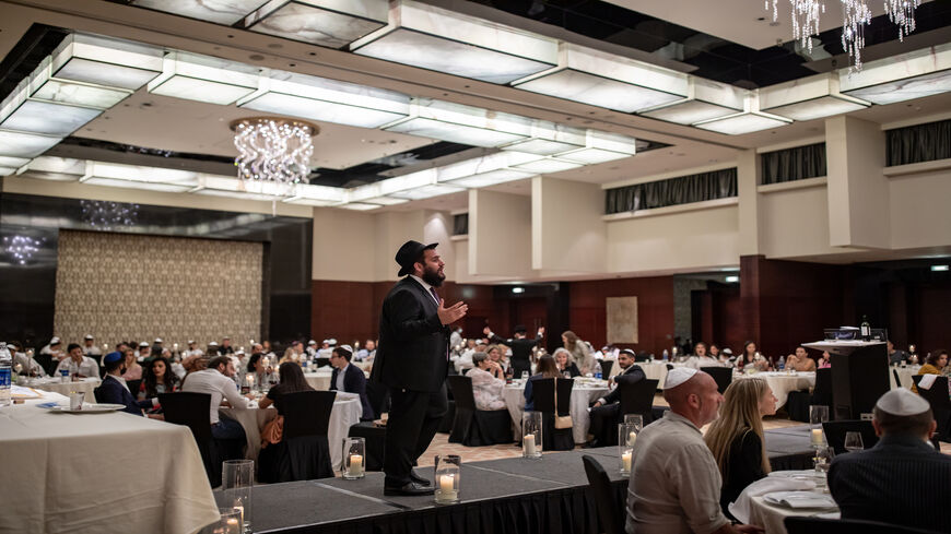 Rabbi Levi Duchman leads more than 200 local Jewish residents and tourists in celebrating Passover at the Address Hotel Marina, Dubai, United Arab Emirates, March 27, 2021.